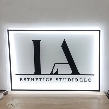 Slender LED blade sign for interior wall mounting in retail spaces
